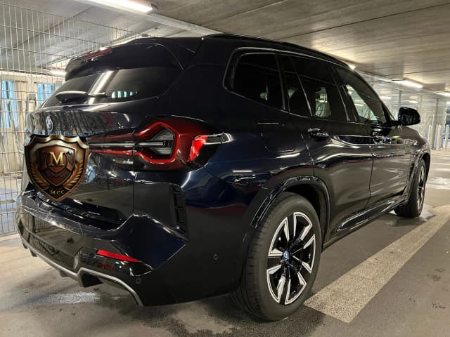 MMCC PureShield SiO₂ ceramic protection — vehicle exterior after professional waterless valet